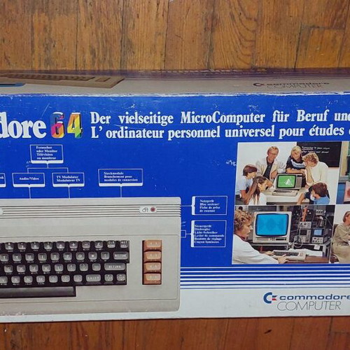 Commodore 64 like new with original box and warranty sticker