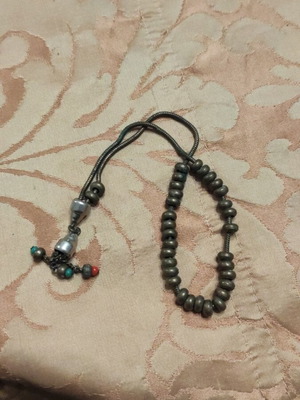 Handmade bronze worry beads used with snake-shaped chain