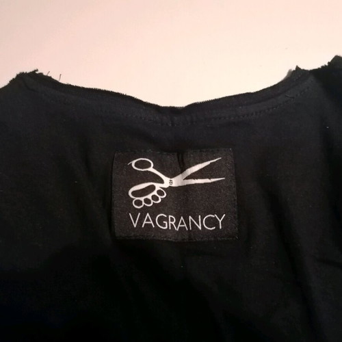 Vagrancy T-shirt size M black like new with low neckline