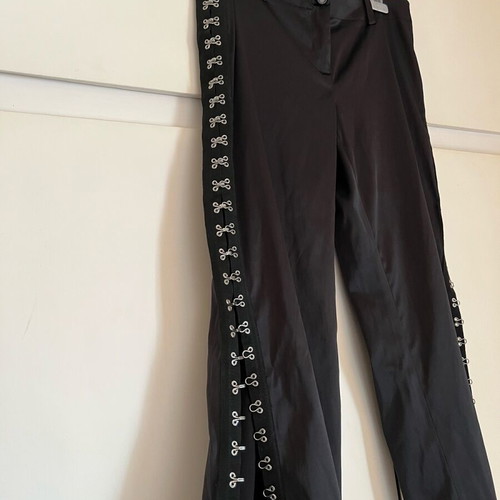 New shiny black pants with a design on the side