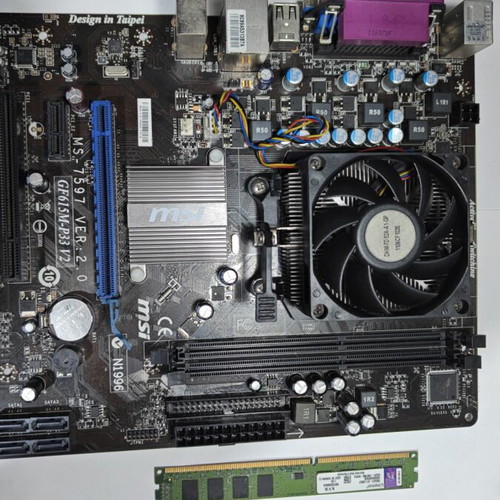 MSI GF615M-P33 V2 motherboard set used with AMD Sempron 145 CPU, 4GB RAM, cooler