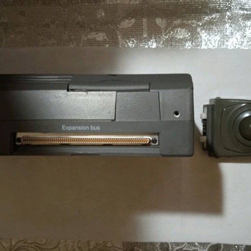 Texas Instruments vintage laptop used, 1980s with charger and mouse