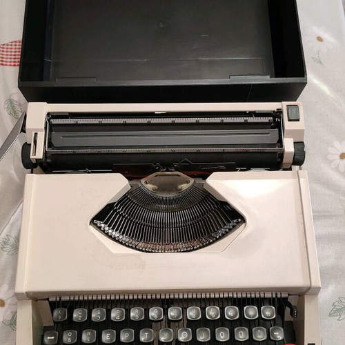 Olympia antique typewriter used with cover and keys