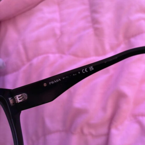 Prada eyeglasses black used with replaceable lenses