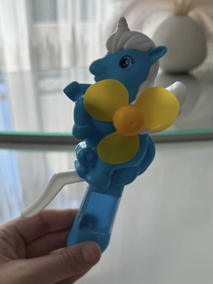 Children's handheld fan used, in very good condition