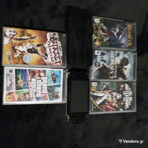  Sony PSP +5 games + leather case