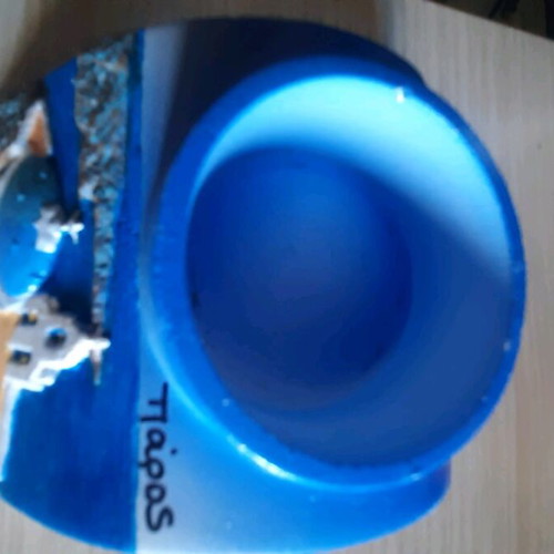Souvenir candle holders from Paros like new