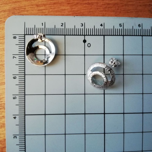 Silver 925 earrings like new, linear textured design