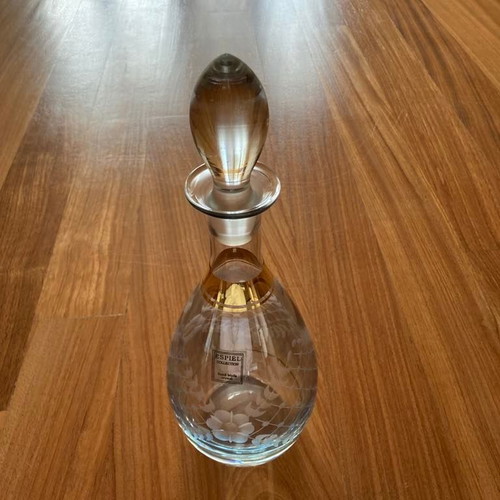 Crystal wine carafe with gold detail and engraved design