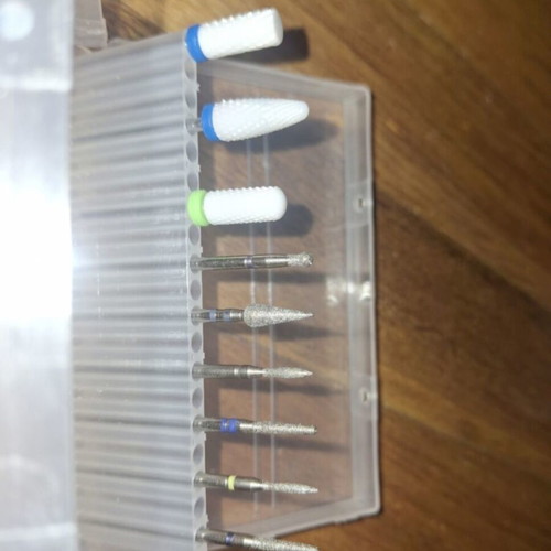 Nail set with professional nail drill bits, brushes and 2 nail pushers
