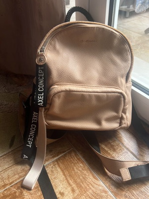 Axel beige backpack in good condition