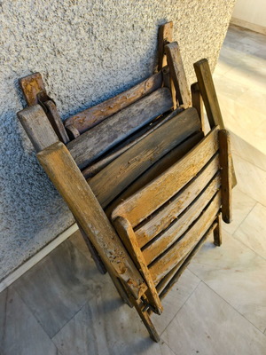 Wooden outdoor chairs used, set of 5, one with broken plank