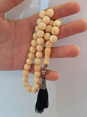 Worry beads made of bone with 33 beads and tassel used