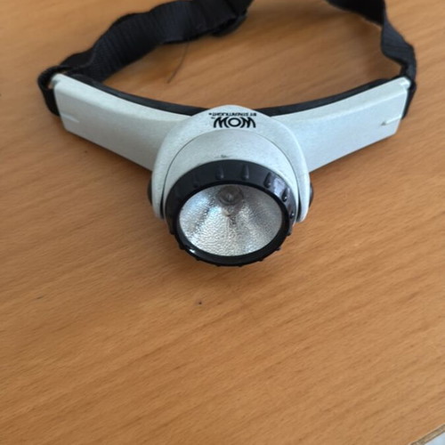 Head and hand flashlight used with conventional bulb