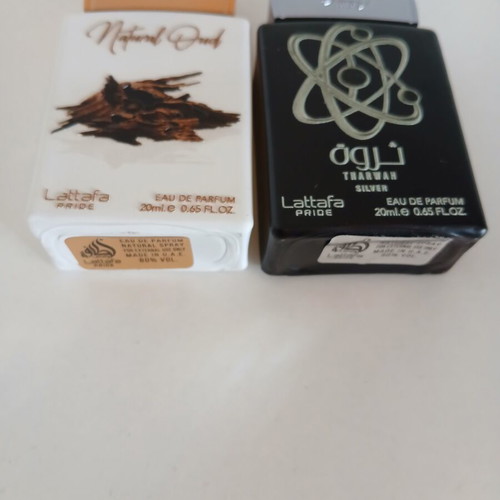 Lattafa Natural Oud and Tharwan Silver perfume set like new