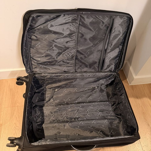 Large wheeled travel suitcase like new, black