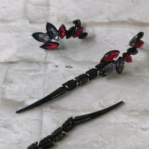 Earrings new, impressive with red and purple stones
