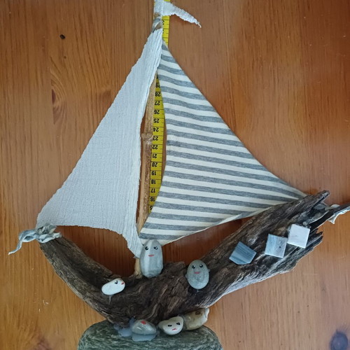 Handmade decorative ship from driftwood and pebbles, new