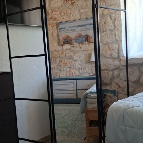 Metal room divider with full-length mirror and hanger, like new