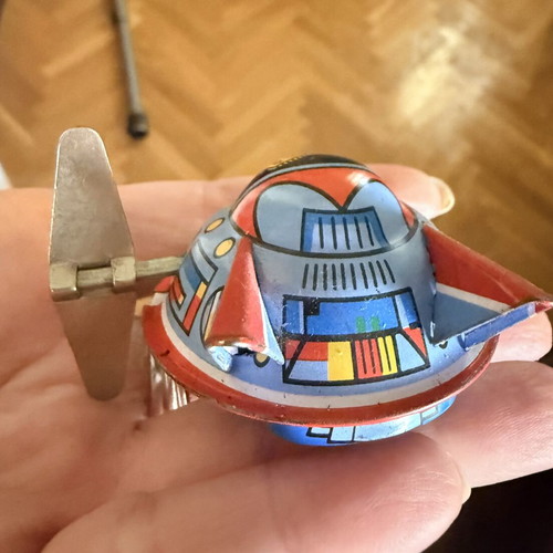 Vintage tin toy UFO with wind-up mechanism used