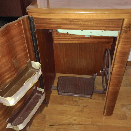 Ideal sewing machine used, foot-powered with motor, wooden cabinet