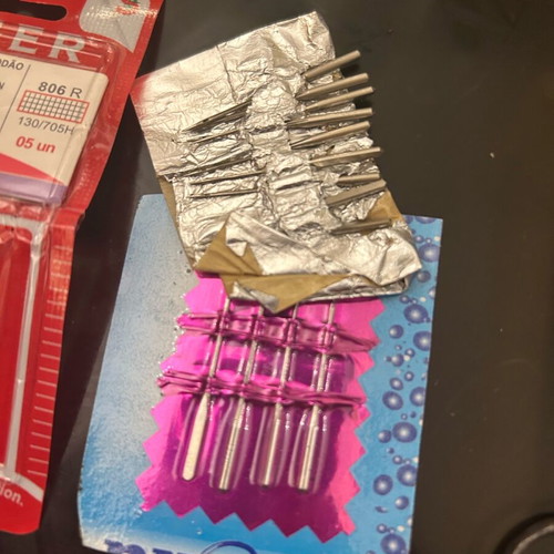 Singer sewing machine needles and knitting needle set, new, about 40 pieces