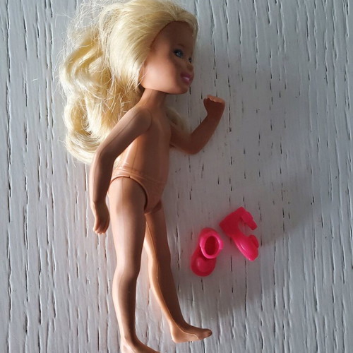 Barbie girl with her shoes used