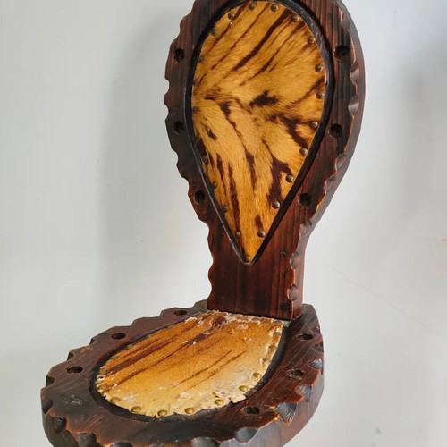 Spanish rustic chair used with three legs and animal leather