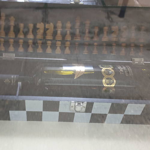 Wooden chessboard with organic Limnos wine in gift packaging new