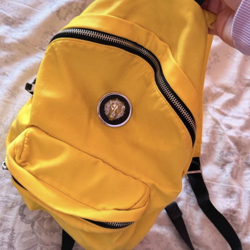 Versace backpack like new with leather details yellow
