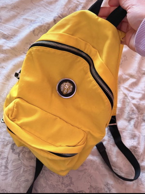 Versace backpack like new with leather details yellow