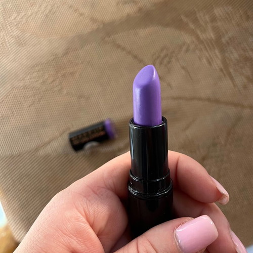 Makeup Revolution Scandalous Lipstick used once, purple shade, moisturizing