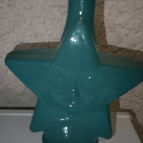 Star-shaped bottle with cork like new