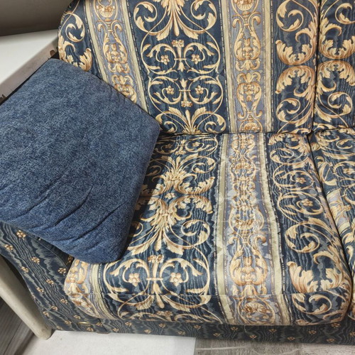 Two-seater sofa with storage compartment