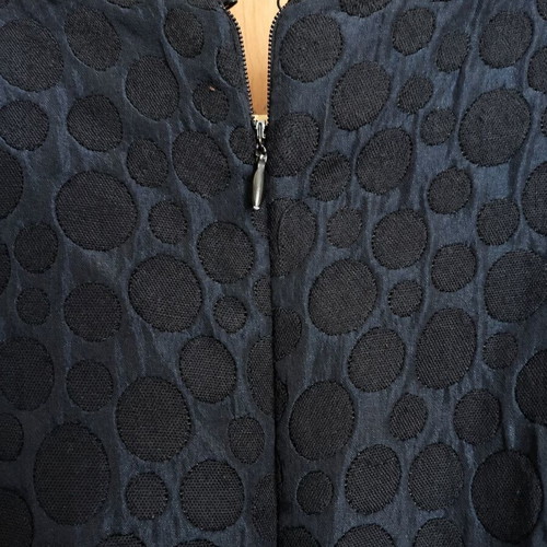 ACCESS Fashion black sleeveless top with embossed circle pattern, M