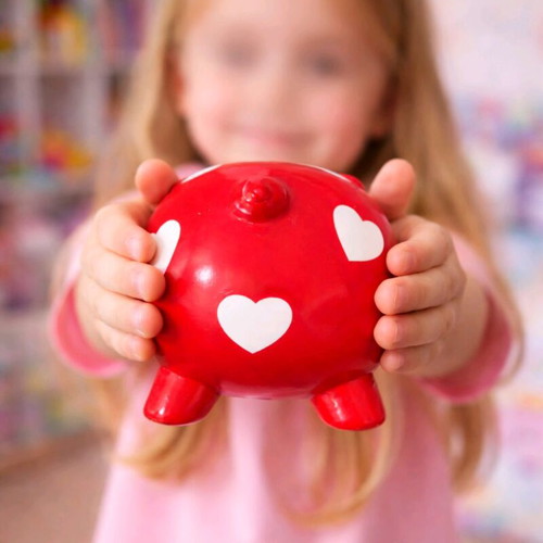 Ceramic piggy bank with hearts like new