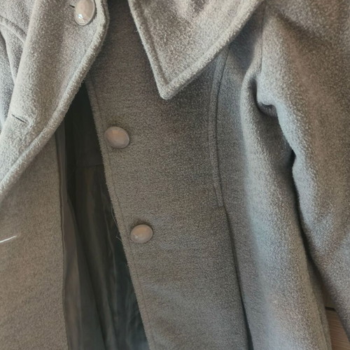Children's coat like new for 8 years with bow at collar