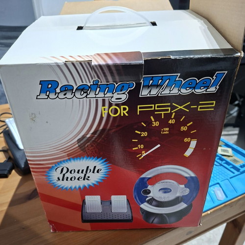 Racing Wheel Dotcom like new for PlayStation 1 and 2 with pedals and box