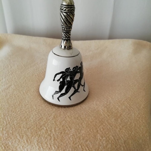 Ceramic Bell with Runners Design like new