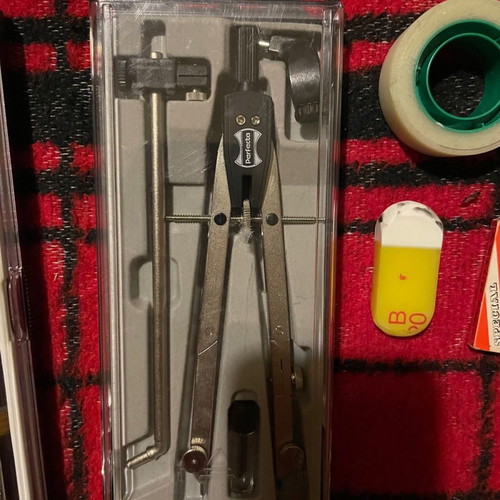 Professional drawing set used with tools and papers