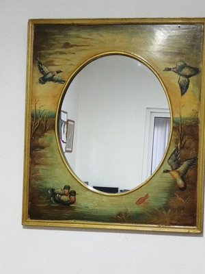 Oval mirror used with handmade wooden frame from the 70s