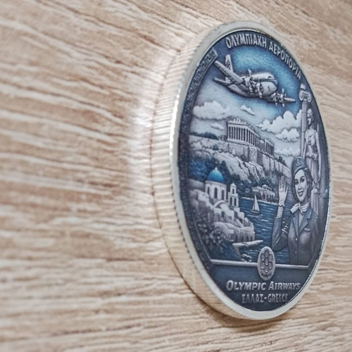 Olympic Airways commemorative coin like new with silver finish