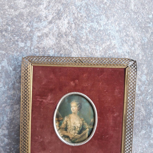 Vintage frame used with velvet and silk portraits of women