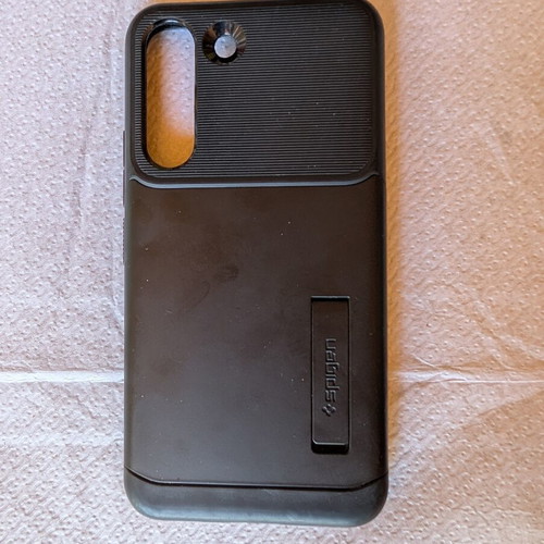 Samsung Galaxy S22 used, black, with Spigen military case