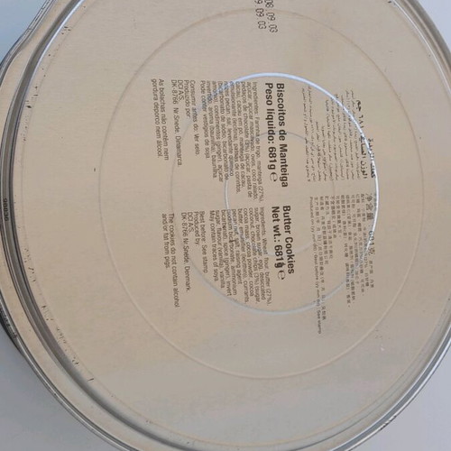 Maersk metal biscuit tin used with some dents