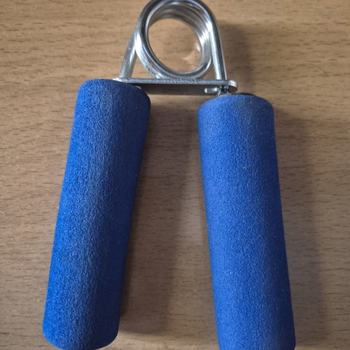 Men'sHealth hand grip strengthener with foam handles and metal spring