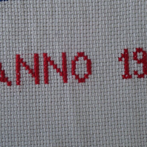 Embroidery with traditional costumes and Dutch scenes like new