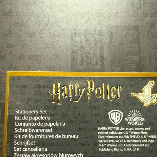 Harry Potter stationery set with pen, weekly planners, post-its, and lightning bolt clips