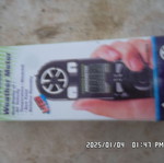 Handheld anemometer used with temperature display