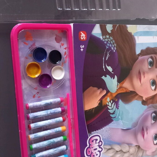 Large painting pad with watercolors and crayons used, Frozen theme